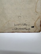 古い紙に手書きの文字が見える画像
